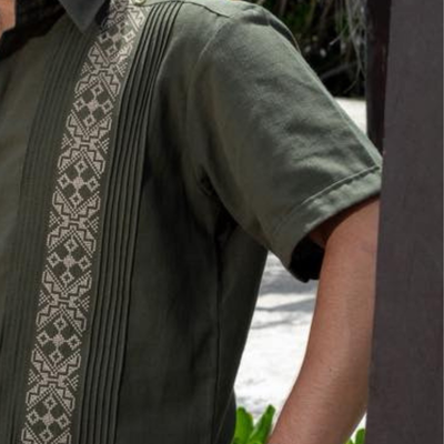 man wearing military green linen guayabera shirt