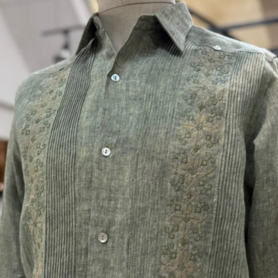 man wearing olive green presidential linen guayabera