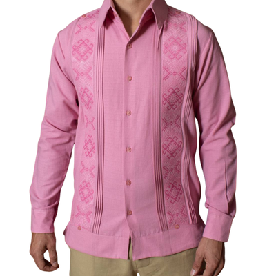 man wearing pastel pink embroidered guayabera shirt