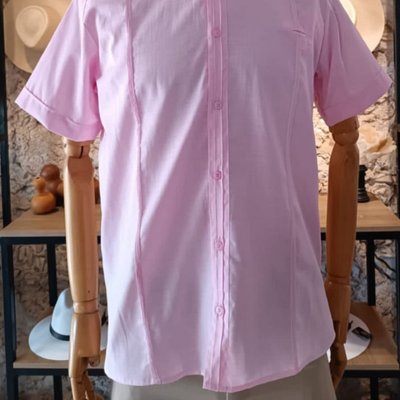 man wearing pink mandarin collar guayabera