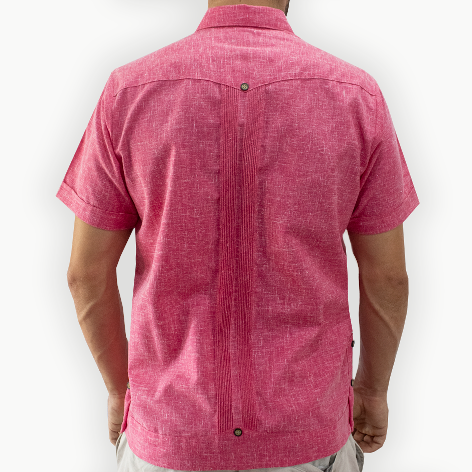 man wearing pink short sleeve embroidered guayabera shirt