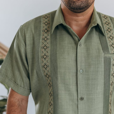 man wearing pistachio green short sleeve guayabera