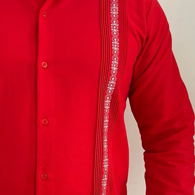 man wearing red long sleeve guayabera