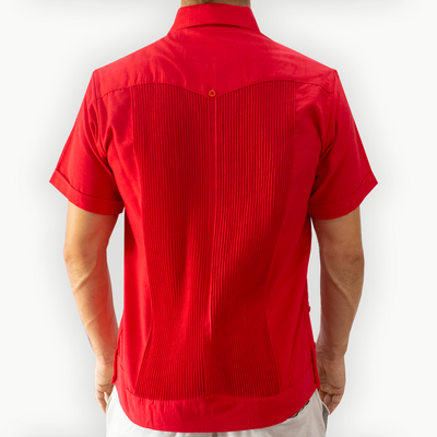 man wearing red short sleeve guayabera