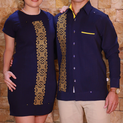 man wearing royal blue embroidered guayabera with yellow details