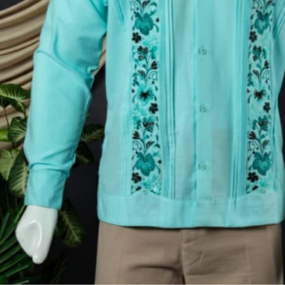 man wearing sea green guayabera short sleeve shirt